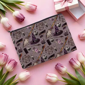 Detailed view of the mystical magic themed cosmetic pouch featuring witch hats.