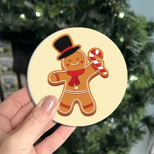 Christmas gingerbread man round cup coaster detail close up festive table decor accessory