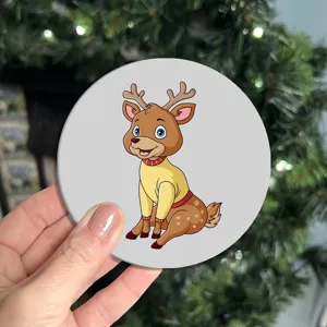 Cute cartoon reindeer leather coaster detail, ideal for table decoration and protection.