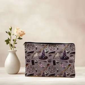 Detailed shot of cosmetic bag featuring vintage witch magical pattern design fabric utility pouch.
