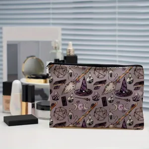 Detailed view of a purple witchy makeup bag with magic pattern on white vanity table.