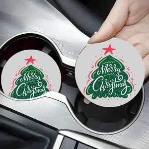 Detailed close-up view of Christmas tree pattern car coaster in automotive cup holder.