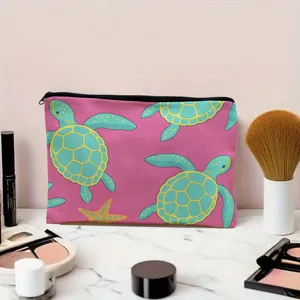 Close-up view of a pink canvas cosmetic pouch featuring cute sea turtle print and zipper.