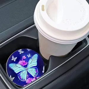 Sottobicchiere rotondo per portabicchieri auto con motivo floreale a farfalla blu.