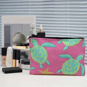 Canvas cosmetic bag with cute turtle print, portable makeup pouch and travel storage organizer.