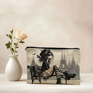Detail shot of canvas cosmetic bag with gothic girl print, stylish makeup pouch close up.