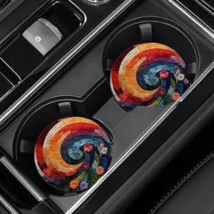 Detailed view of colorful floral spiral car coasters in a cup holder, non-slip design.