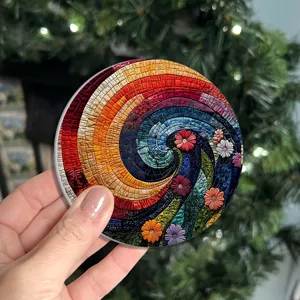 Detail shot of a colorful mosaic swirl pattern round car cup coaster for anti-slip protection.