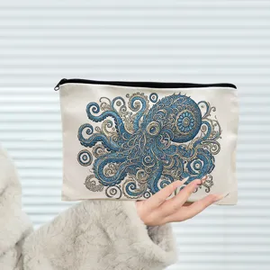 Detailed view of the canvas makeup pouch featuring a stunning blue octopus mandala print.