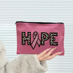 Pink canvas pencil pouch makeup bag with leopard HOPE print and ribbon detail for women and girls.