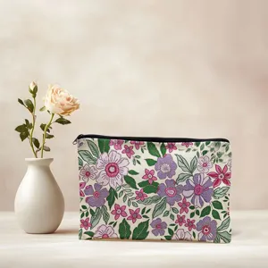 Floral canvas cosmetic bag, portable zipper makeup pouch for travel and daily storage use.