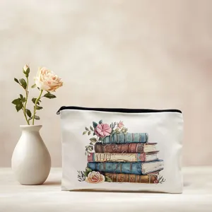 Vintage floral canvas makeup pouch, aesthetic book print cosmetic storage bag for daily use.
