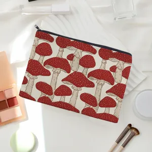 Detail view of canvas cosmetic bag with cute mushroom print, perfect for portable daily storage.