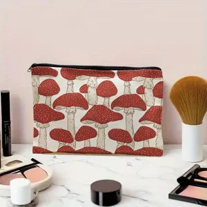 Portable canvas cosmetic bag makeup storage pouch with cute red mushroom pattern.