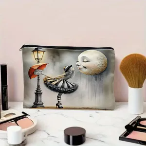 Detailed view of portable canvas cosmetic bag featuring surreal moon illustration for toiletries and makeup.