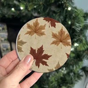 Round anti-slip car coaster with classic autumn maple leaf pattern, perfect table mat.