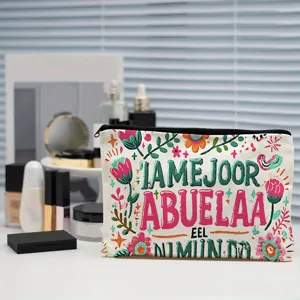 Close-up of a floral canvas makeup pouch with artistic typography, ideal for cosmetic storage.