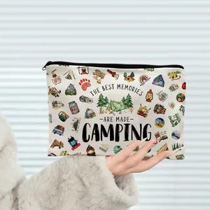 Close-up of a canvas pouch with camping print and black zipper, perfect for daily storage.