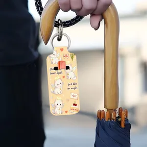Lipstick holder keychain detail, cute angel cat print neoprene sleeve for easy daily carry.
