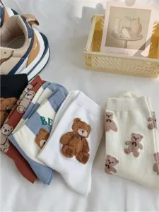 Cute cartoon bear plush mid-calf socks for women, sweet casual cotton hosiery items.