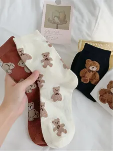 Cute cartoon bear mid-tube socks, sweet style soft cotton daily wear cozy detail close-up.