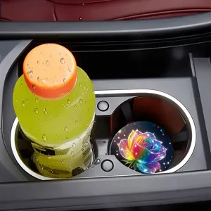 Car cup holder coaster with colorful glowing rose pattern, shown inside vehicle.