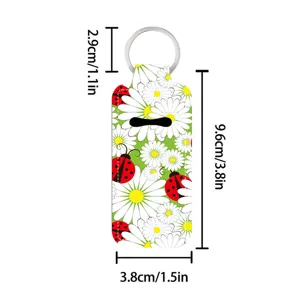 Floral lipstick sleeve keychain with ladybug pattern, portable lip balm holder pendant for bags.
