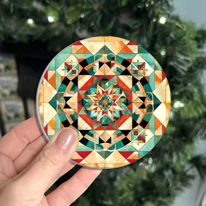 Geometric mandala pattern round car coaster for coffee cup holder and dining table use.