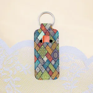 Neoprene lipstick holder keychain with boho mandala pattern, portable lip balm sleeve bag charm.