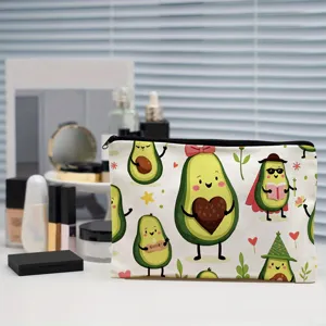 Detailed view of cute cartoon avocado printed cosmetic bag, multi-functional travel pouch for women.