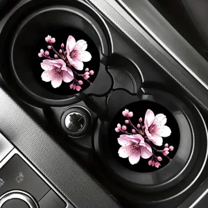 Car cup coasters set, non-slip silicone auto cup holder inserts with pink cherry blossom design.