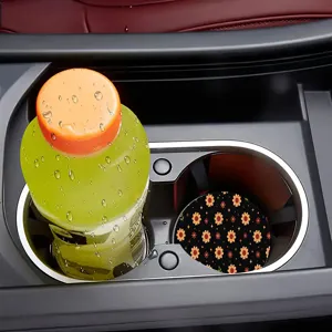Silicone car cup coaster with cute orange floral pattern, non-slip heat-resistant drink mat.