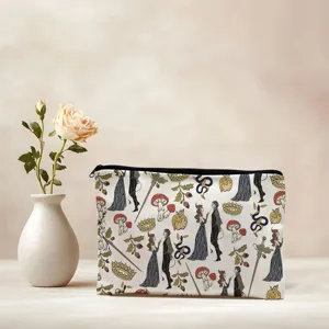 Vintage fairy tale pattern cosmetic bag detail shot showing unique retro aesthetic design.