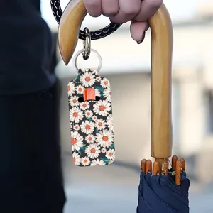 Daisy floral lipstick sleeve keychain holder, portable lip balm bag with metal ring.