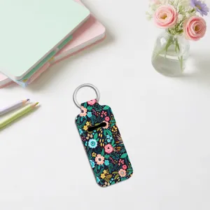 Floral print lipstick holder keychain, portable lip balm sleeve with metal ring for women.