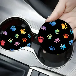 Universal car cup holder coaster with colorful paw print design for auto interior decor.