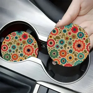 Round retro floral car cup coaster detail shot, vibrant flower print, car interior decor.