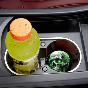 Car coaster with green glowing skull pattern for auto cup holder interior accessory.