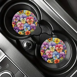 Gros plan détaillé sur ces sous-verres de voiture floraux vibrants et colorés.