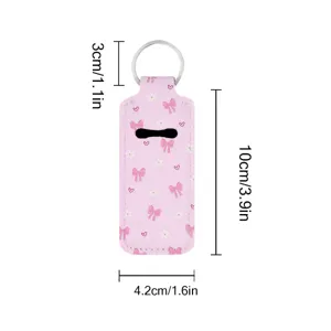 Pink neoprene lipstick holder keychain with cute bow and flower print, portable key chain pouch.