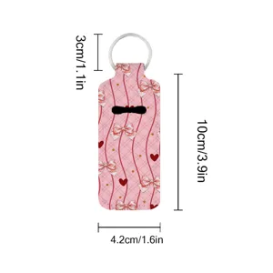Neoprene lipstick holder keychain with charming bow print, showing clear product dimensions for use.