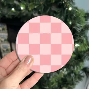 Pink checkerboard pattern car coaster, round cute aesthetic car accessory for daily use.
