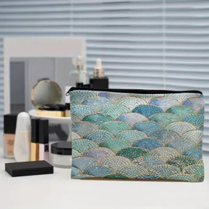 Blue mosaic pattern cosmetic bag detailed view, portable zipper pouch for daily makeup storage.