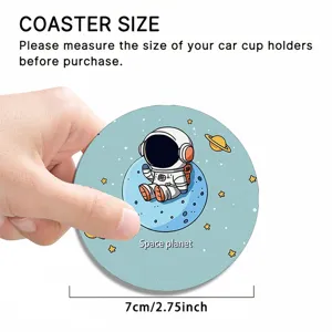 Car cup coaster detail view showing astronaut pattern and compact size for vehicle holders.