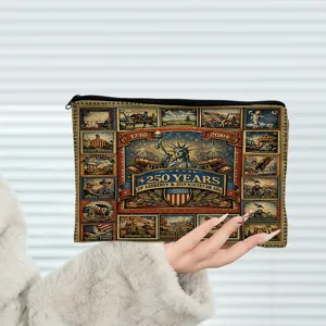 Detailed view of a vintage historical tapestry cosmetic pouch featuring a secure zipper closure.