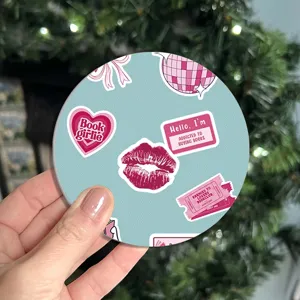 Round non-slip silicone cup coaster with cute pink bookish pattern for home table decor.