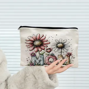 Canvas makeup bag detail, watercolor floral MOM print design, portable zipper storage pouch.
