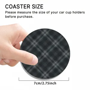 Detail shot of a black plaid car cup coaster showing size dimensions and hand scale reference.