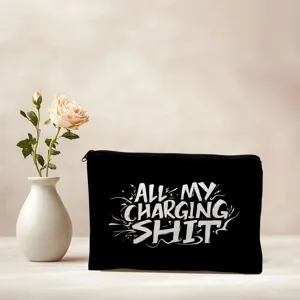 Sac organisateur de câble zippé en toile noire, trousse de voyage cosmétique avec imprimé blanc.