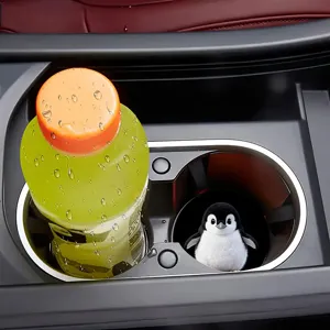 Car cup holder coaster detail view showcasing interior placement and cute accessories.